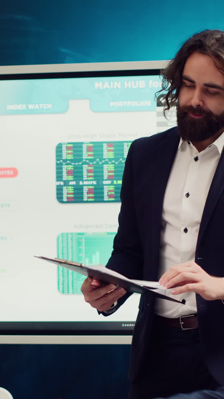 Businessman Presenting Financial Charts During Office Meeting