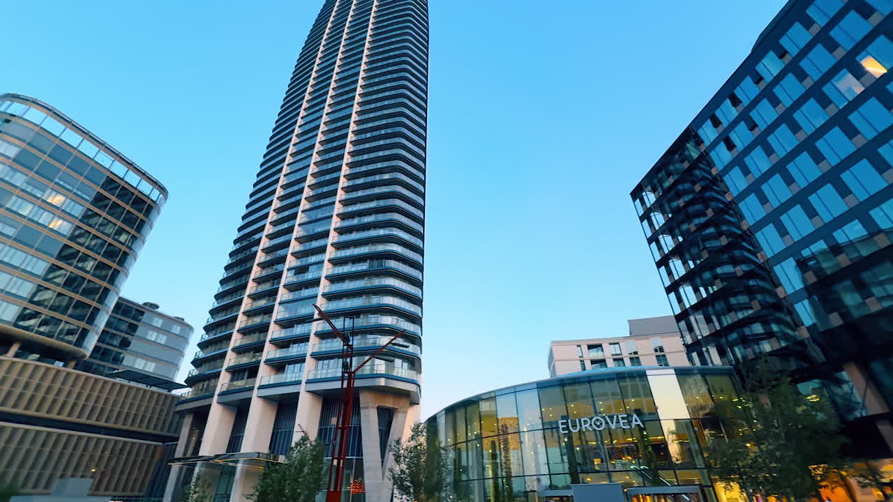 Beautiful diverse buildings of varied design in the modern city. Contemporary architecture of Bratislava, Slovakia. Low angle view