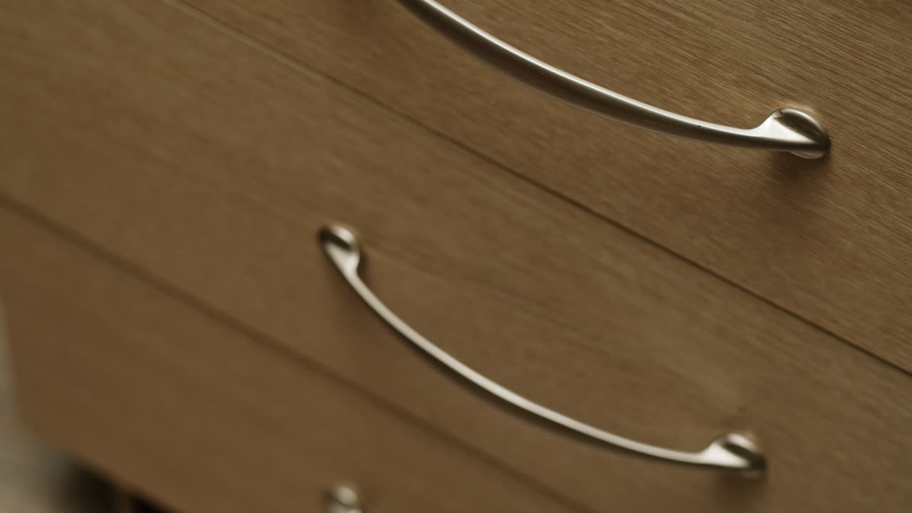 Young woman trying to untangle many various of wires close-up. Tangled wires and cables on table. Trying to untangle many messy and chaos cables