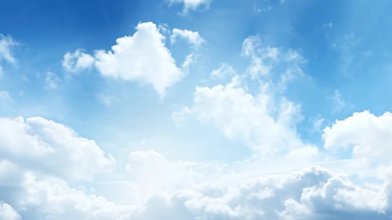 White Clouds Drifting Across a Bright Blue Sky