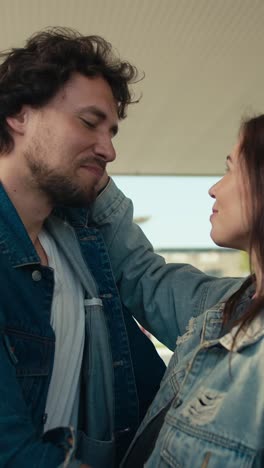 couple at a gas station