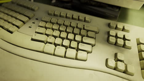old keyboard covered in dust reveals forgotten technology from the past