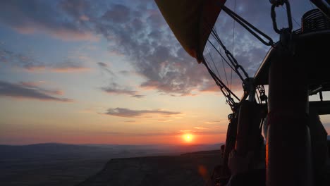 stunning sunrise view over cappadocia seen from inside hot air balloon basket