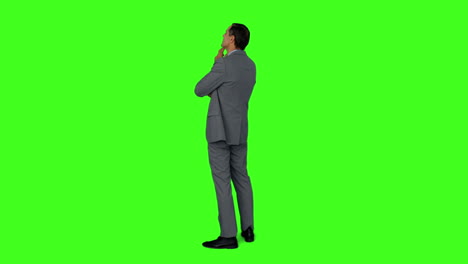 Businessman-standing-and-thinking