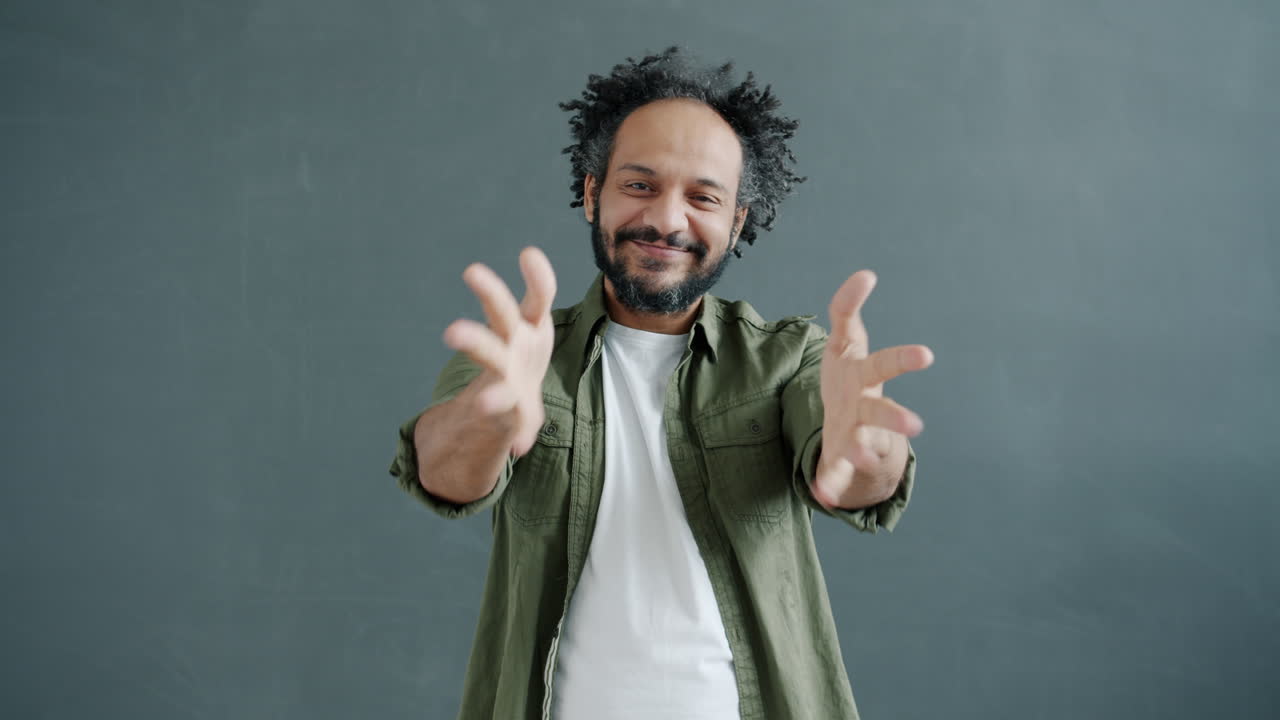 Man Dancing and Gesturing