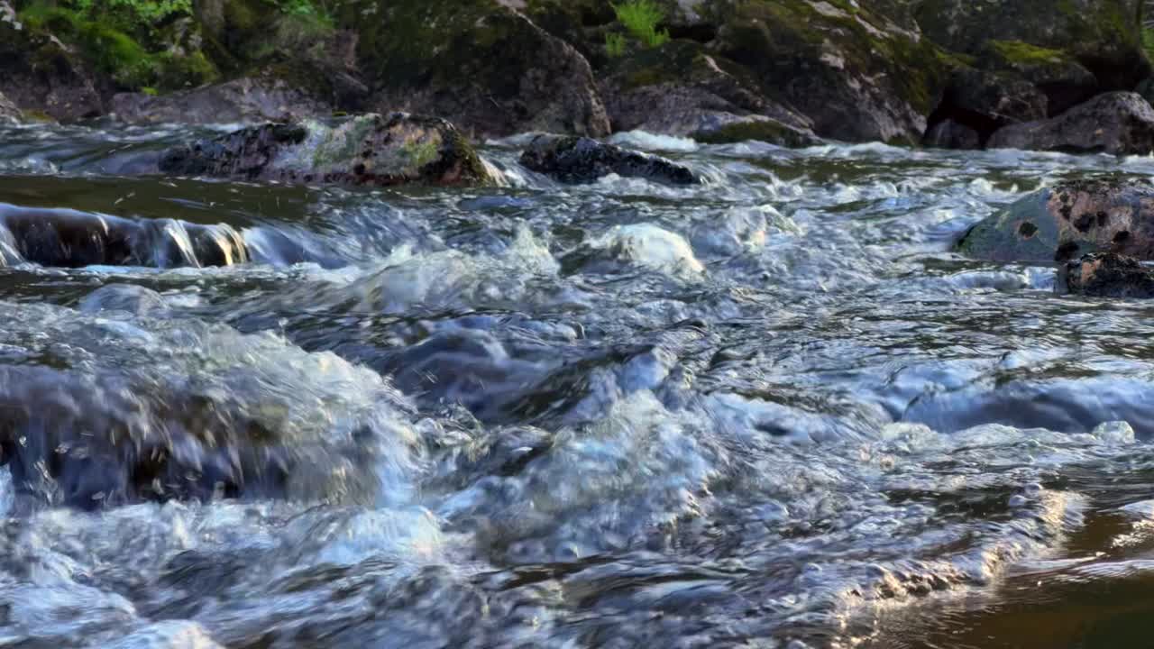 4K slow-motion video of a beautiful Norwegian river in spring