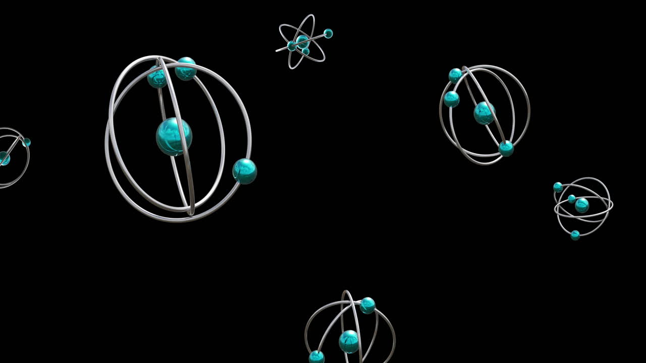 Animation of atom models spinning on black background