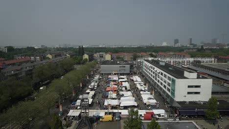 time lapse of square market, city bustling area at plein central square of the garden city slotermeer in amsterdam