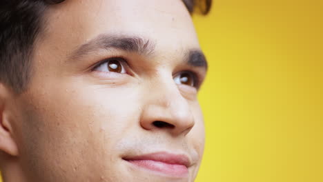 close-up portrait of a man looking up