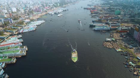 4k-Drone-shot-of-launch-moving-on-a-river