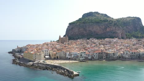 Reverse-reveal-of-the-port-of-Cefalu,-Italy