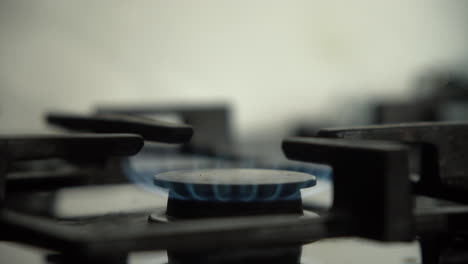 turning on a gas stove