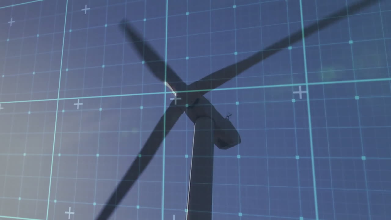 Wind turbine tower and blades rotating under digital grid overlay in animated 3D render