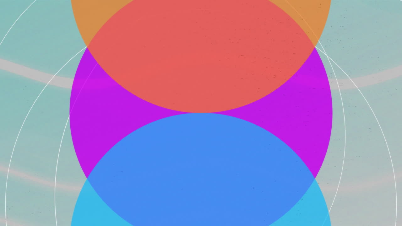 animación de círculos de colores vibrantes sobre un fondo azul con patrones