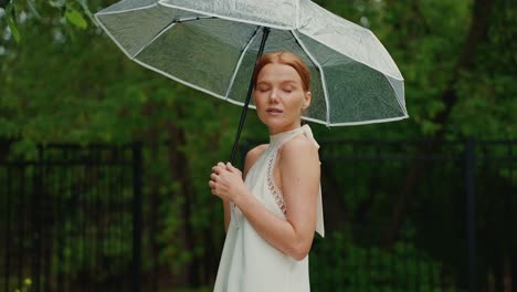 woman with umbrella in the rain