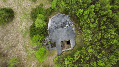 descending on the ruins of the abandoned german bunker during world war 2 in tromso, norway