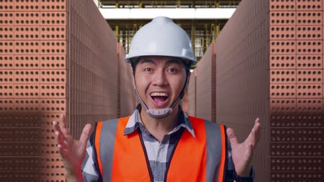 excited construction worker in a brick factory