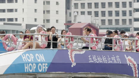 many tourists take a boat tour on the chao phraya river