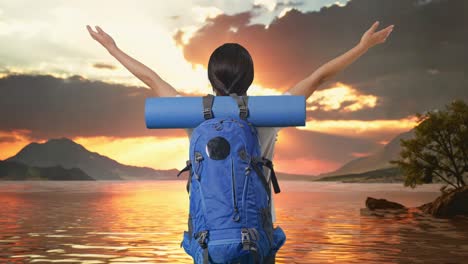 woman hiking at sunset