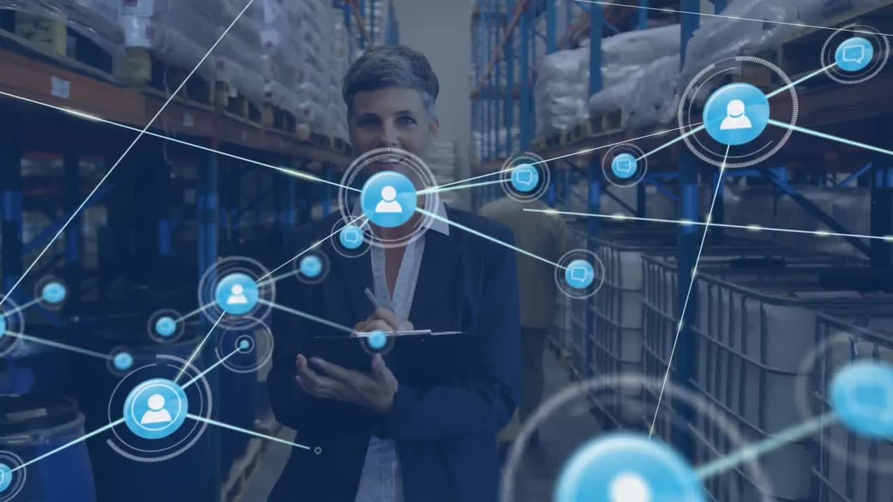 animación de una red de conexiones con iconos sobre una mujer de negocios caucásica que trabaja en un almacén.