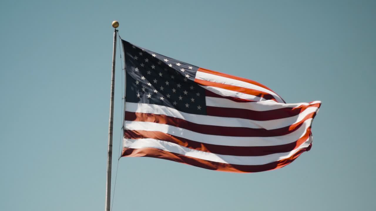 Huge American flag flying in slow motion