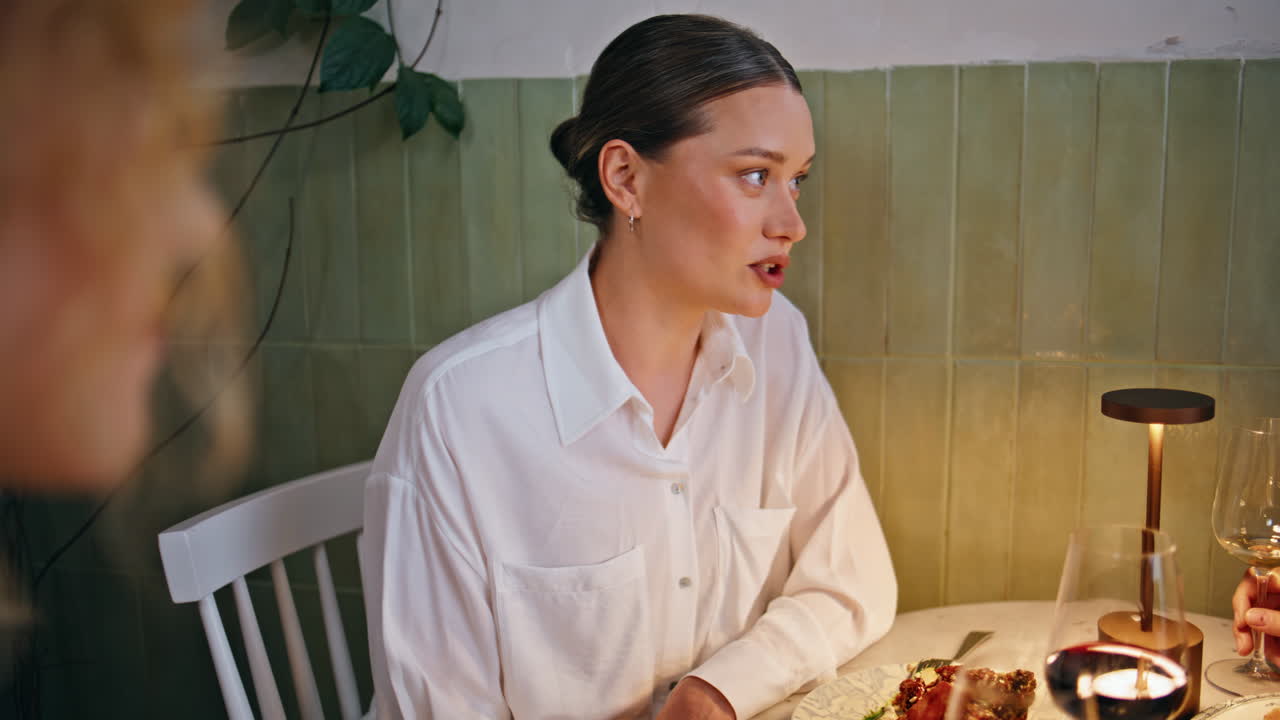 Ladies friends chatting cafeteria enjoying food drinks closeup. Woman gossiping