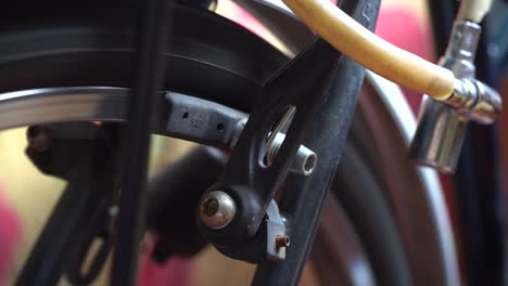 bicycle wheel with spokes spinning moves, break in action