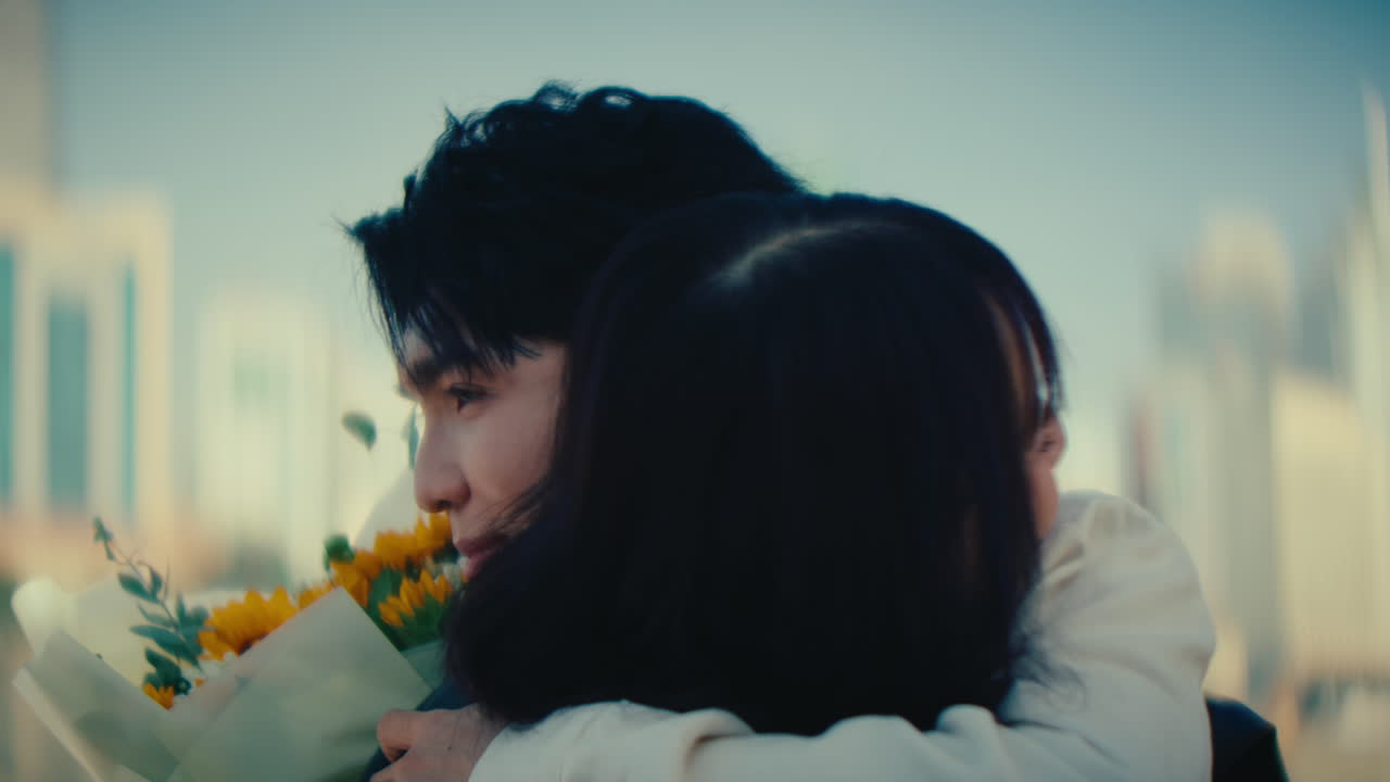 couple of lovers hug each other in love with flower , healthy relationship in city lifestyle