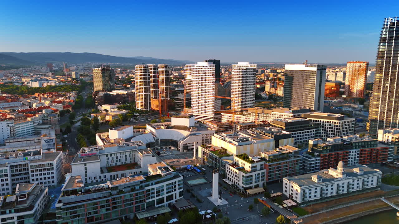 Skylines of Bratislava at sunset. Beautiful view of Bratislava modern skyline with buildings against a vibrant evening sky