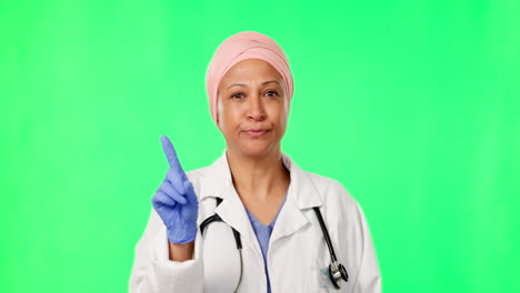 doctor, mujer y dedo para no por pantalla verde