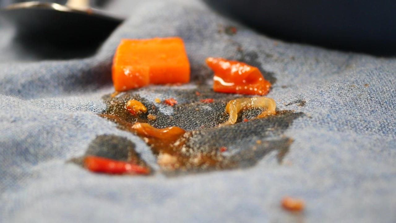 Messy Food Spilled on Blue Fabric