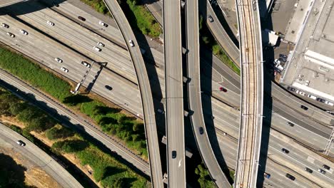 top down drone time lapse of traffic cutting through downtown seattle