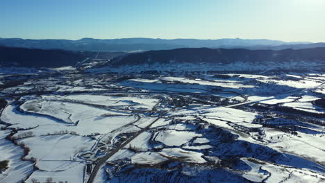 snowy mountain valley aerial view