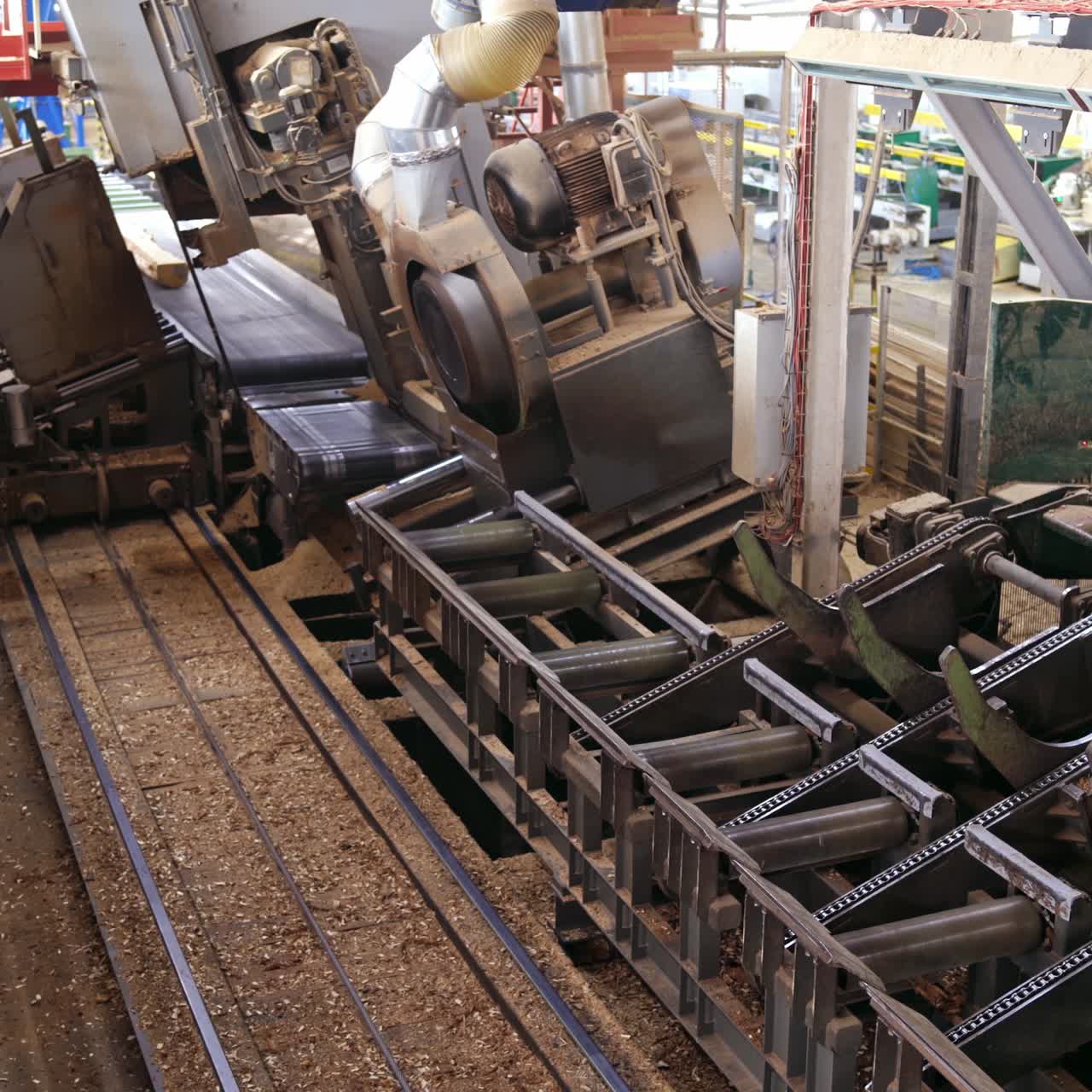 Interior of sawmill with lumber pile