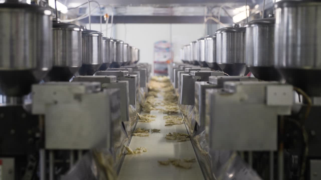 Shot of a moving conveyor with corn chips