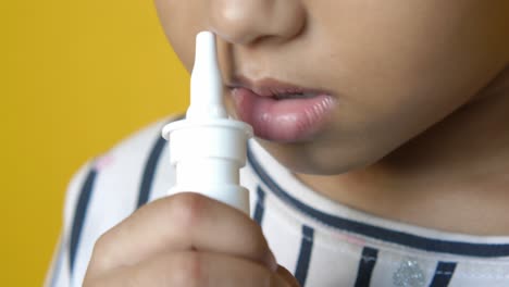 child using nasal spray