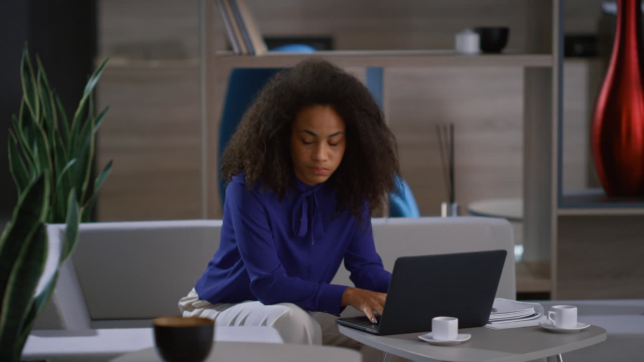 Young businesswoman working on laptop