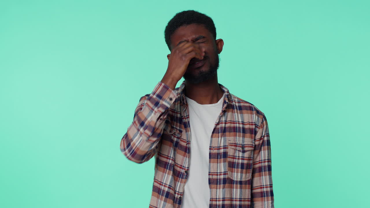 Young man waiting for good luck, loses becoming surprised sudden lottery results, bad fortune loss