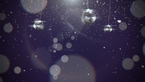 Animated-closeup-motion-silver-balls-and-snowflakes-on-purple-background