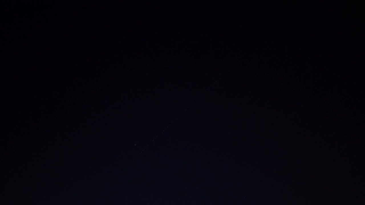 A brilliant chain of communication satellites orbits the earth, Starlink, Space X