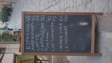 cafe menu on a blackboard in a european city