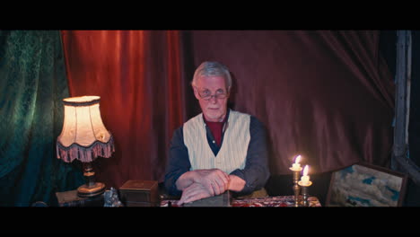 a photographer and an antique dealer in the gypsy circus cart