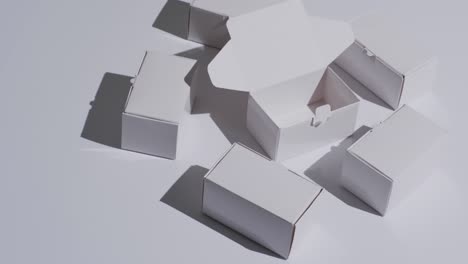 video of white cardboard boxes with copy space over white background