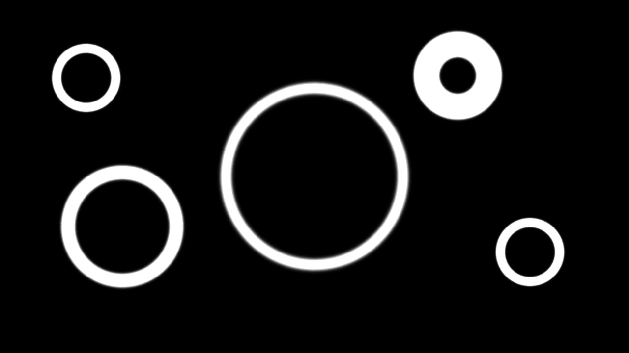 Abstract Animation of Pulsing White Circles on Black Background