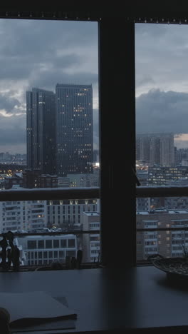 city view from a window at twilight