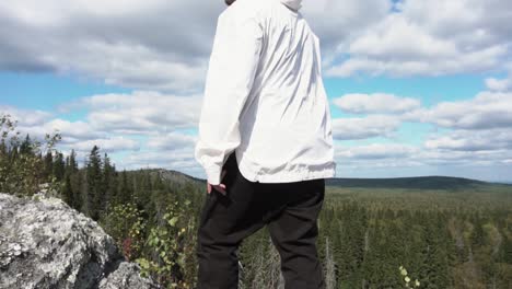 person hiking on mountain top