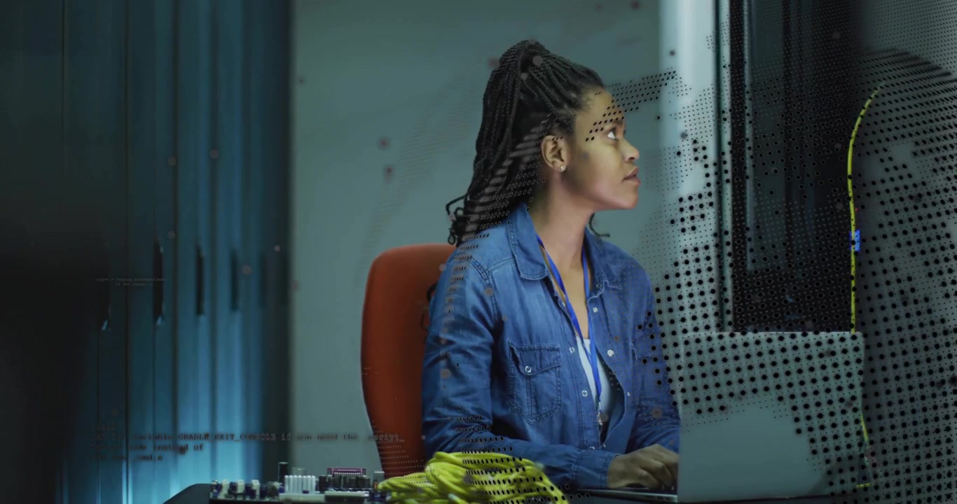 Woman assembling yellow network cables in technology lab, with animated data streams