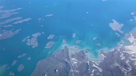 Good-Aerial-Over-The-Greenland-Ice-Sheet-As-It-Is-Breaking-Up-Due-To-Global-Warming