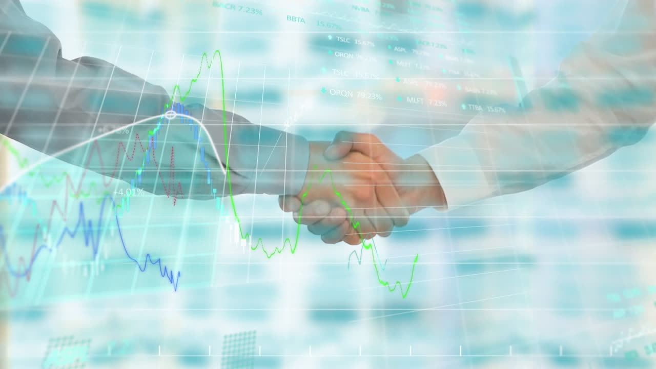 Elaborazione di dati finanziari con sullo sfondo uomini d'affari che si stringono la mano.