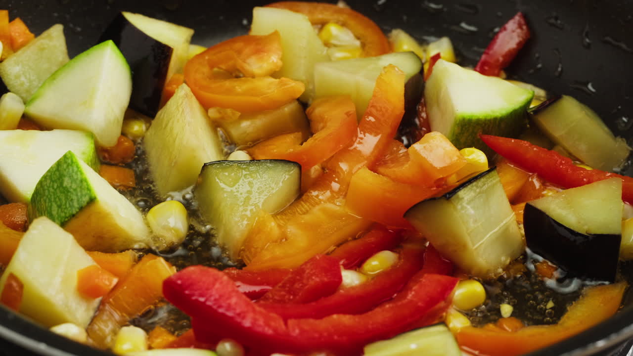 Close-up of Fresh Chopped Vegetables Frying in a Pan